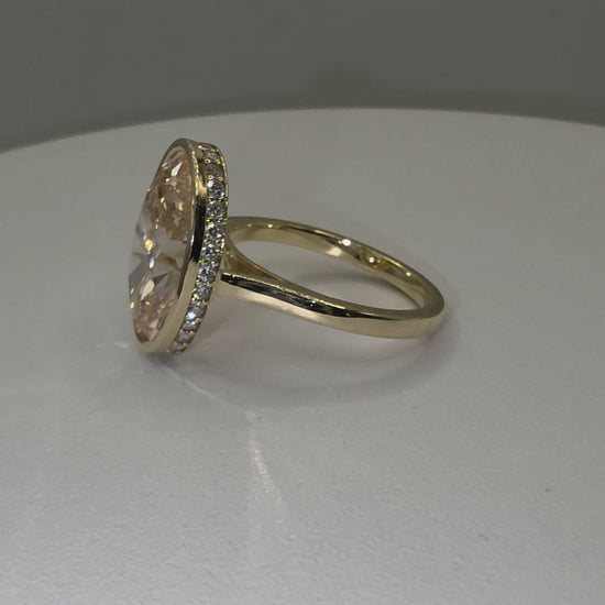 Pink diamond and yellow gold ring