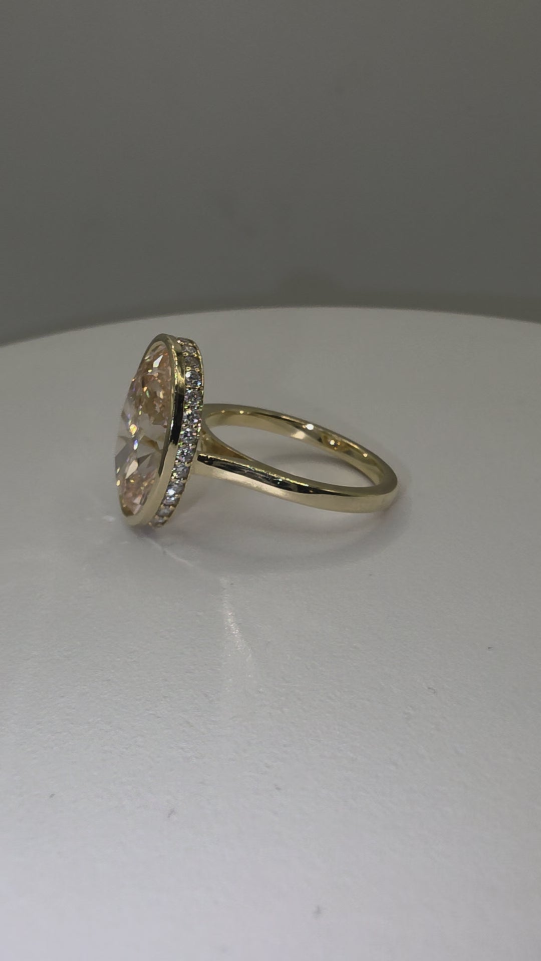 Pink diamond and yellow gold ring