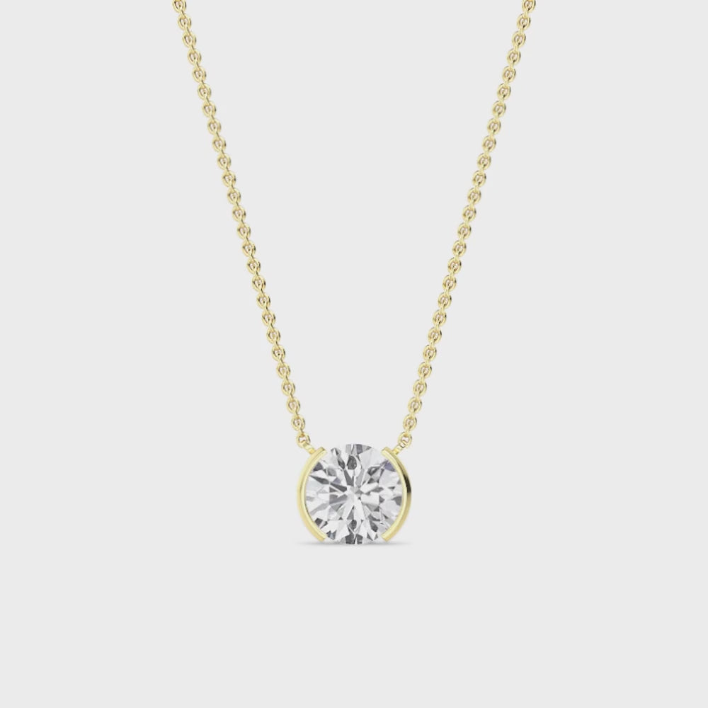 yellow gold diamond necklace on a white background