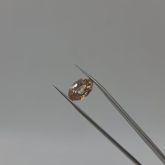 Video of yellowish brown lab grown diamond