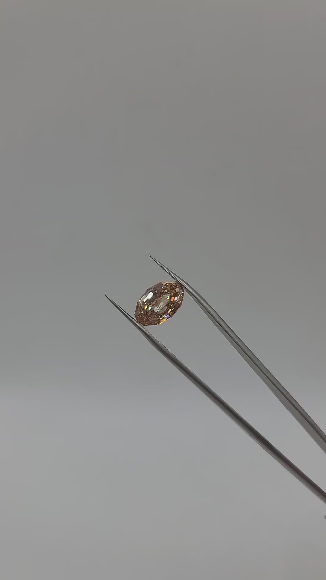 Video of yellowish brown lab grown diamond