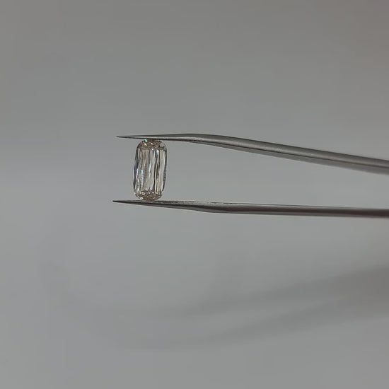Video of lab grown crisscut diamond held by tweezers