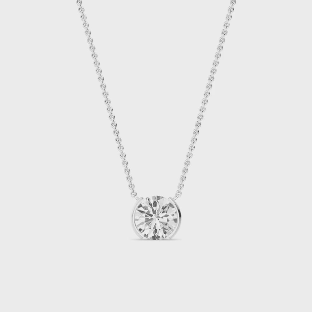 round diamond necklace on a white background
