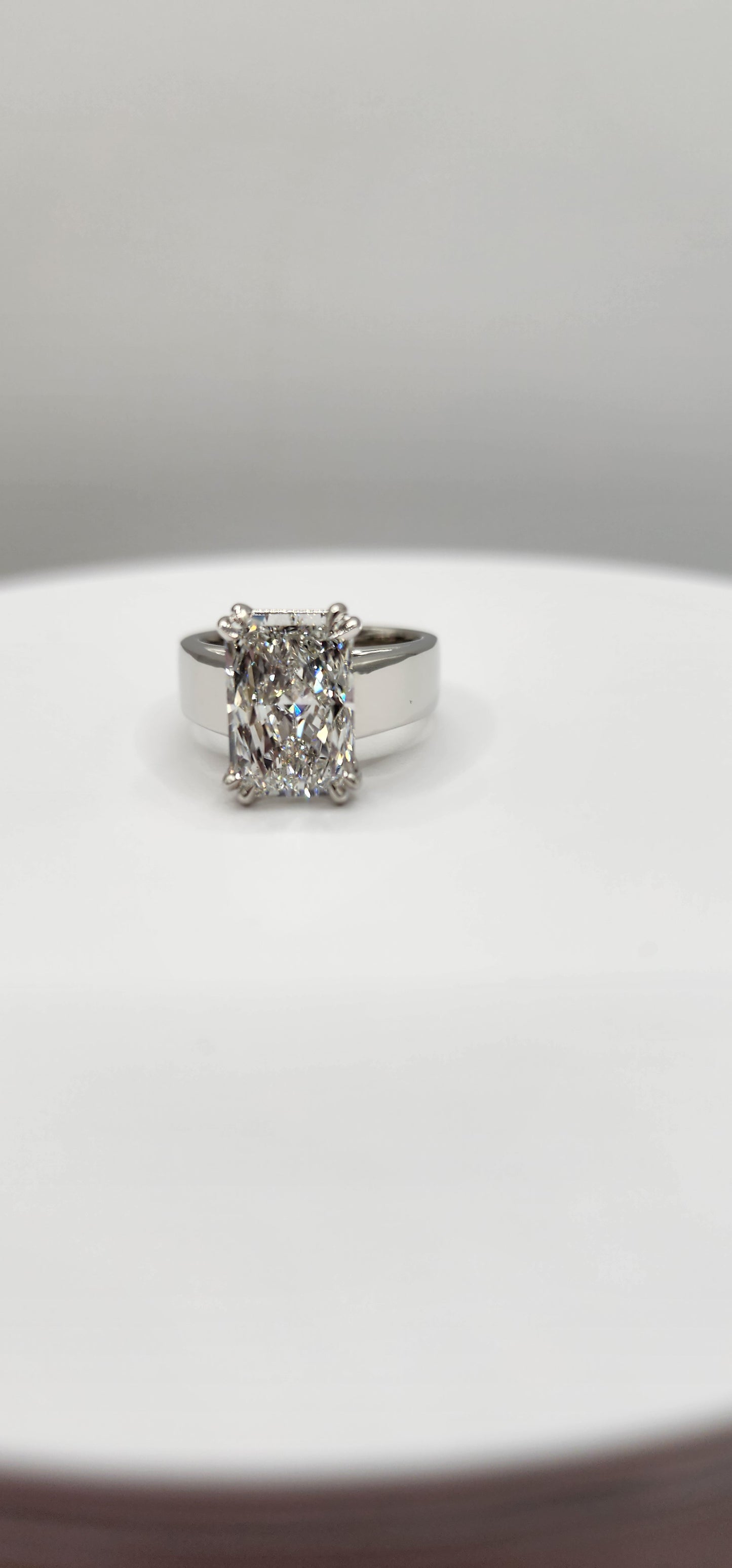 "The MaryLu"  in White Gold - 4.5 Radiant Cut Lab Grown Diamond, F, VS1 on 14K White Gold 5.5 mm Cigar Band, with 14K White Gold Double-Claw Prongs, IGI Certified Lab Grown Diamond